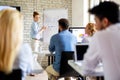 Portrait of creative business people team working together and smiling in office. Royalty Free Stock Photo