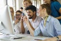 Portrait of creative business people team working together and smiling in office. Royalty Free Stock Photo