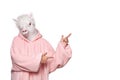 Portrait of creative person in pink hoodie with lama mask pointing up isolated on white