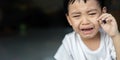 Portrait of a crying baby Asian boy. Crying sad children concept Royalty Free Stock Photo