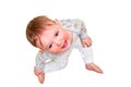 Portrait of a crying toddler boy sitting on the floor, isolated on a white background. Face of an unhappy child with tears in his Royalty Free Stock Photo