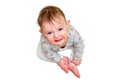 Portrait of a crying toddler boy sitting on the floor, isolated on a white b Royalty Free Stock Photo