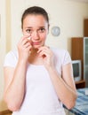 Portrait of crying woman at home Royalty Free Stock Photo