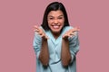 Portrait of a cute adorable asian american woman looking at camera, excited, funny expression Royalty Free Stock Photo