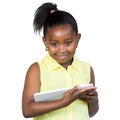 Portrait of cute african girl holding digital tablet. Royalty Free Stock Photo