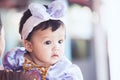 Portrait of cute asian baby girl wearing beautiful bow Royalty Free Stock Photo