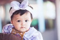 Portrait of cute asian baby girl wearing beautiful bow Royalty Free Stock Photo