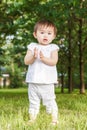 Portrait of cute Asian child clapping her hands Royalty Free Stock Photo
