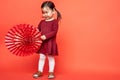 Little girl with paper fans Royalty Free Stock Photo