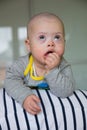 Portrait of cute baby boy with Down syndrome