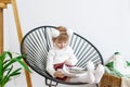 Portrait of cute baby girl reading book at home Royalty Free Stock Photo