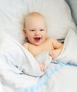 Portrait cute baby lying in his bed home bedtime