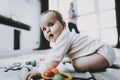 Portrait of Cute Baby Playing with Toys Indoors Royalty Free Stock Photo