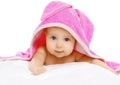 Portrait of cute baby under the pink towel Royalty Free Stock Photo