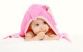 Portrait of cute baby under towel lying Royalty Free Stock Photo