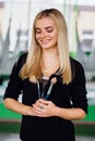 Portrait of a cute beautiful girl mekeup artist natural with long hair blond. In the studio, anti gravity fitness yoga . Royalty Free Stock Photo