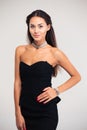 Portrait of a cute beautiful woman in black dress Royalty Free Stock Photo
