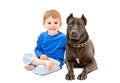 Portrait of cute boy sitting with a dog Royalty Free Stock Photo