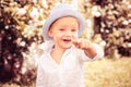 Portrait of cute boy smiling outdoors. Closeup headshot portrait of smiling little boy on nature background, happy small Royalty Free Stock Photo