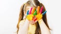 Portrait Cute caucasian preschool little girl with face and hands painted at home. offended child Royalty Free Stock Photo