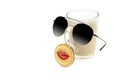 Portrait of a cute character made of a cappuccino glass, sunglasses and a cookie with red lips isolated on white