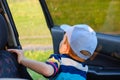 Portrait cute child boy sitting in car seat. Child transportation safety Royalty Free Stock Photo