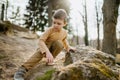 Portrait of cute curious little boy in nautre, autumn concept. Royalty Free Stock Photo