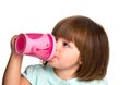 Portrait of a cute drinking little toddler girl Royalty Free Stock Photo