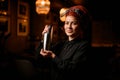 Portrait of cute female bartender in bandana with shaker Royalty Free Stock Photo