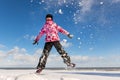 Portrait of cute funny adorable little playful child girl wearing warm snow jacket enjoy having fun playing at park