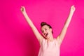 Portrait of cute funny funky thrilled lady celebrate championship positive expression scream shout raise fists yeah