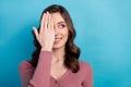 Portrait of cute girl with curly hairstyle wear elegant clothes look at promo empty space hand close eye isolated on Royalty Free Stock Photo