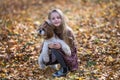 Portrait of a cute girl with her beloved dog