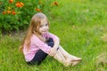 Portrait of a cute girl with long blond hair Royalty Free Stock Photo