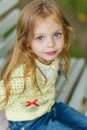 Portrait of a cute girl with long blond hair Royalty Free Stock Photo