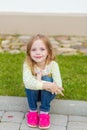 Portrait of a cute girl with long blond hair Royalty Free Stock Photo