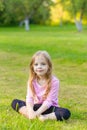 Portrait of a cute girl with long blond hair Royalty Free Stock Photo