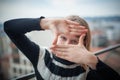 Portrait, cute girl shaping imaginary picture frame with her finger Royalty Free Stock Photo