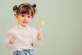 Portrait of cute happy baby girl playing with easter decorations Royalty Free Stock Photo