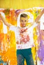 Portrait of a cute happy boy painting and having fun Royalty Free Stock Photo