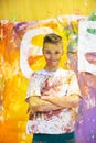 Portrait of a cute happy boy painting and having fun Royalty Free Stock Photo