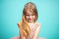 Portrait of cute happy charming little girl in princess dress