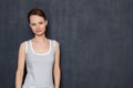 Portrait of cute and happy woman wearing sleeveless shirt