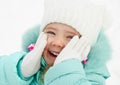 Portrait of cute laughing little girl in winter day Royalty Free Stock Photo