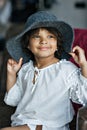 Portrait of cute little african american kid girl in a white dress Royalty Free Stock Photo