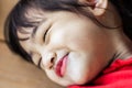 Portrait of cute Little asian girl in moment of happiness. Children sleeping and be smile. Royalty Free Stock Photo