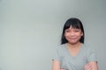 Portrait of a cute little Asian girl, standing happily lollipop, relaxing face, fashionable Asian children who look beautiful and Royalty Free Stock Photo
