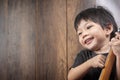 Portraits Cute Little Asian Boy Smile with ukulele.