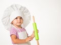 Portrait of a cute little child in a chef`s hat Royalty Free Stock Photo