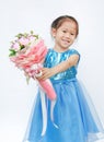 Portrait of a cute little child girl with Bouquet of roses isolated on white background Royalty Free Stock Photo